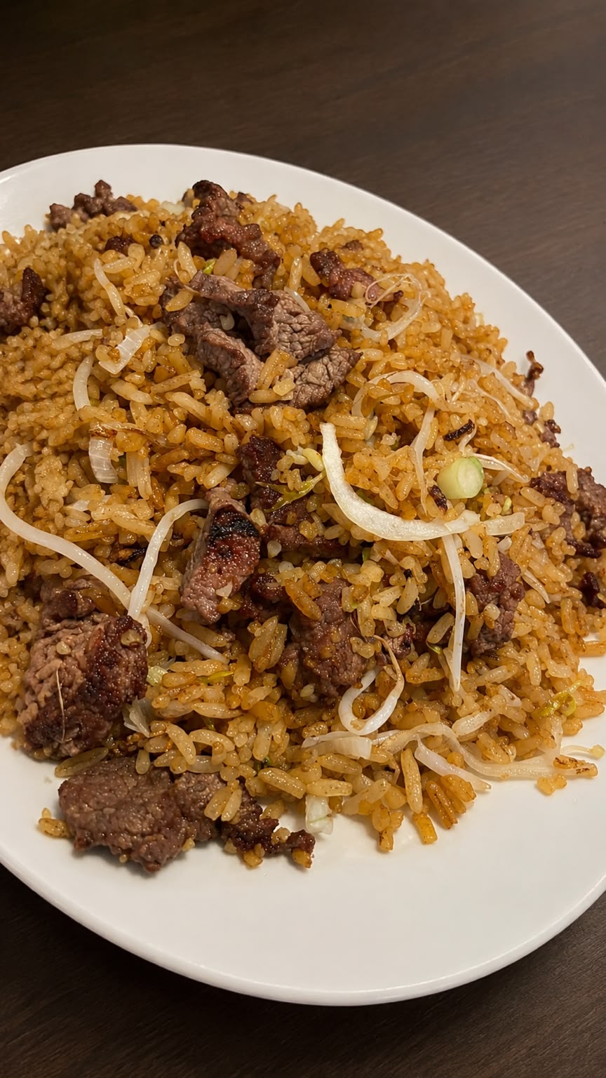 Foto del plato No. 17: Arroz con solomillo